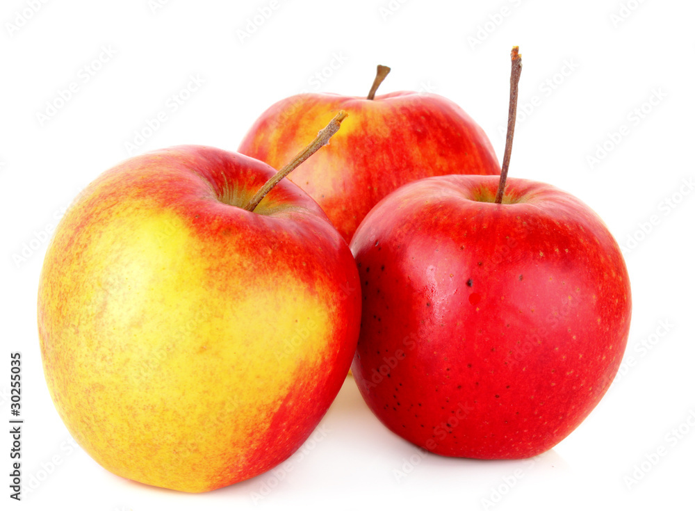Few ripe red apples isolated on white Few ripe red apples isolated on white