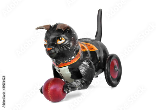 Vintage wind-up tin cat toy with ball