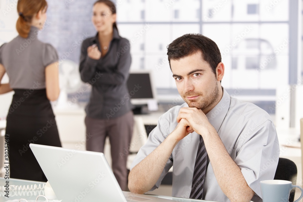 Happy business team having break in office Happy business team having break in office