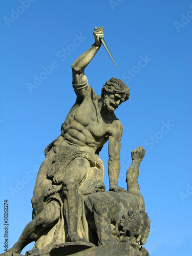 Photography Battling Titan at the Gate of Hradcany Castle, Prague