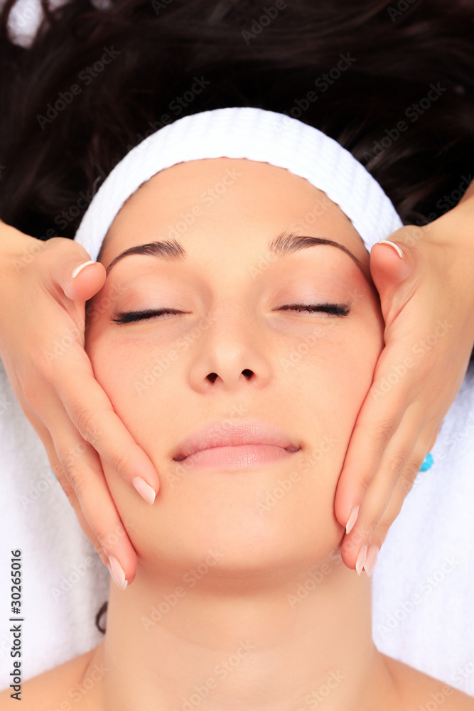 A young woman relaxing at a health spa A young woman relaxing at a health spa