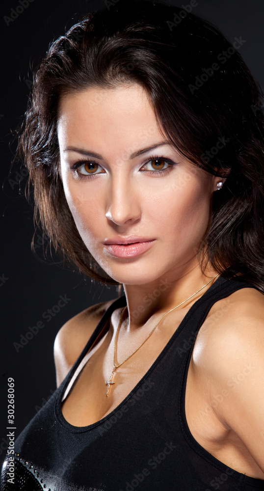 Studio portrait of young attractive brunette female Studio portrait of young attractive brunette female