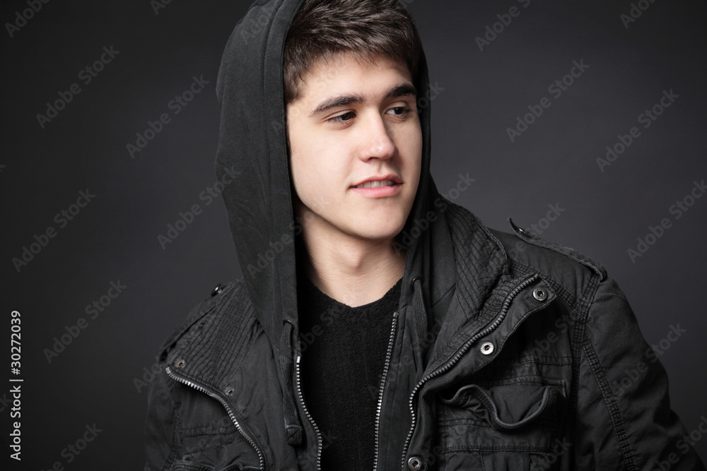 Young attractive happy man possing in studio. Young attractive happy man possing in studio.