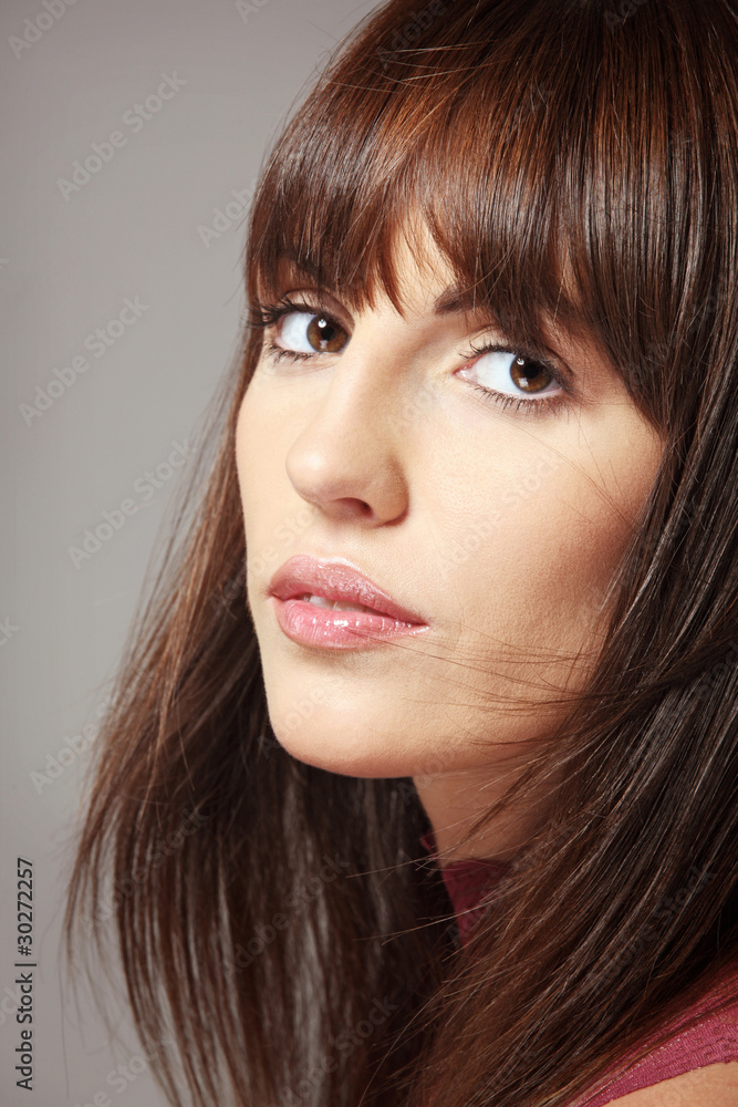 Beautiful woman with long dark hair.