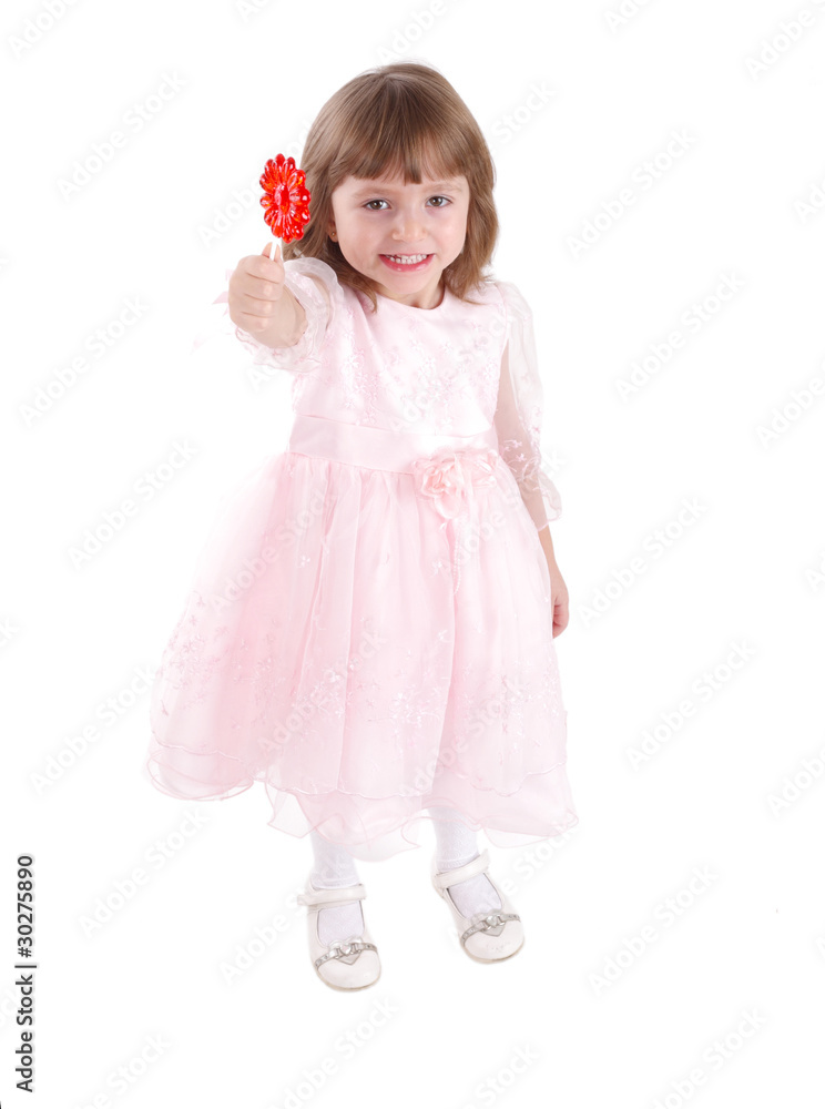 four-year girl  with  sugar candy. isolated