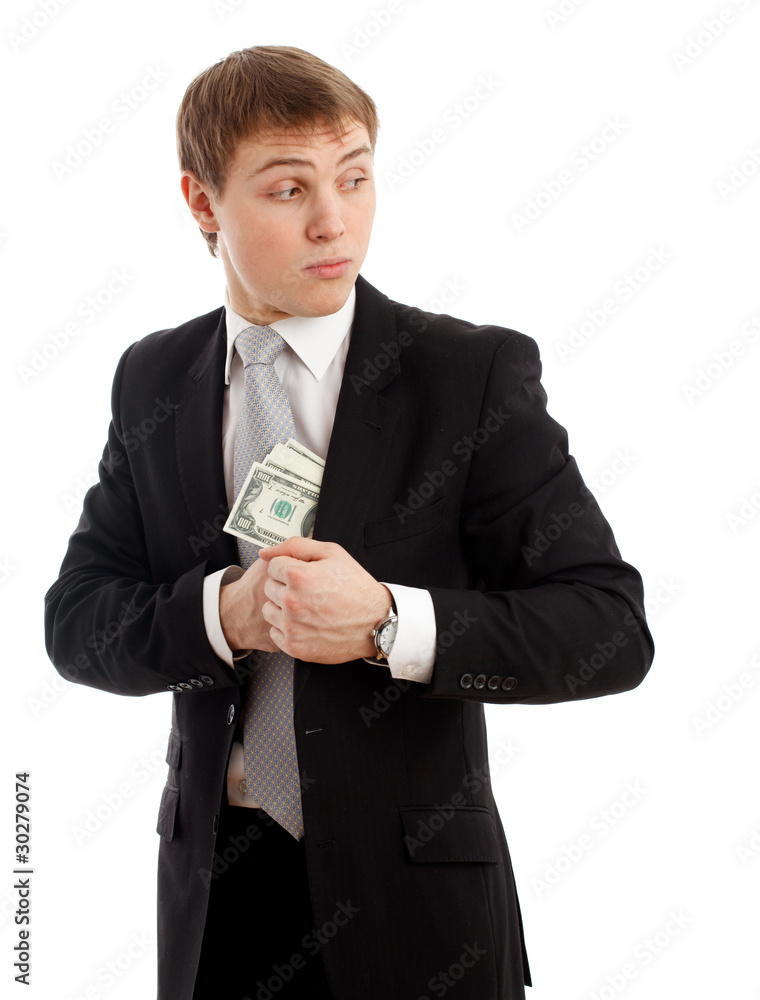 Man in a putting money in his pocket. Man in a putting money in his pocket.