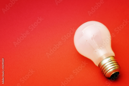 Background with lit lightbulb
