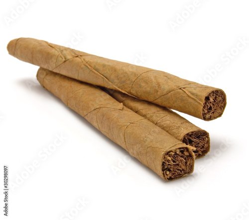 Three cigar stack macro closeup, isolated cigars and shadow