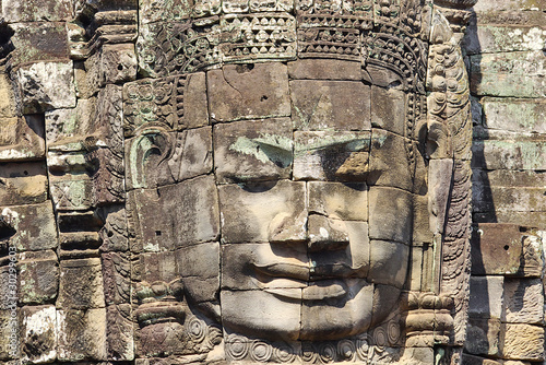 Stone head on towers of Bayon temple in Angkor Thom, Cambodia