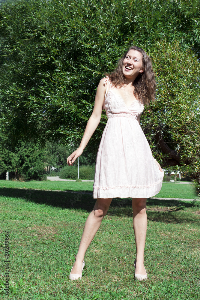 Portrait of the young beautiful smiling woman outdoors Portrait of the young beautiful smiling woman outdoors