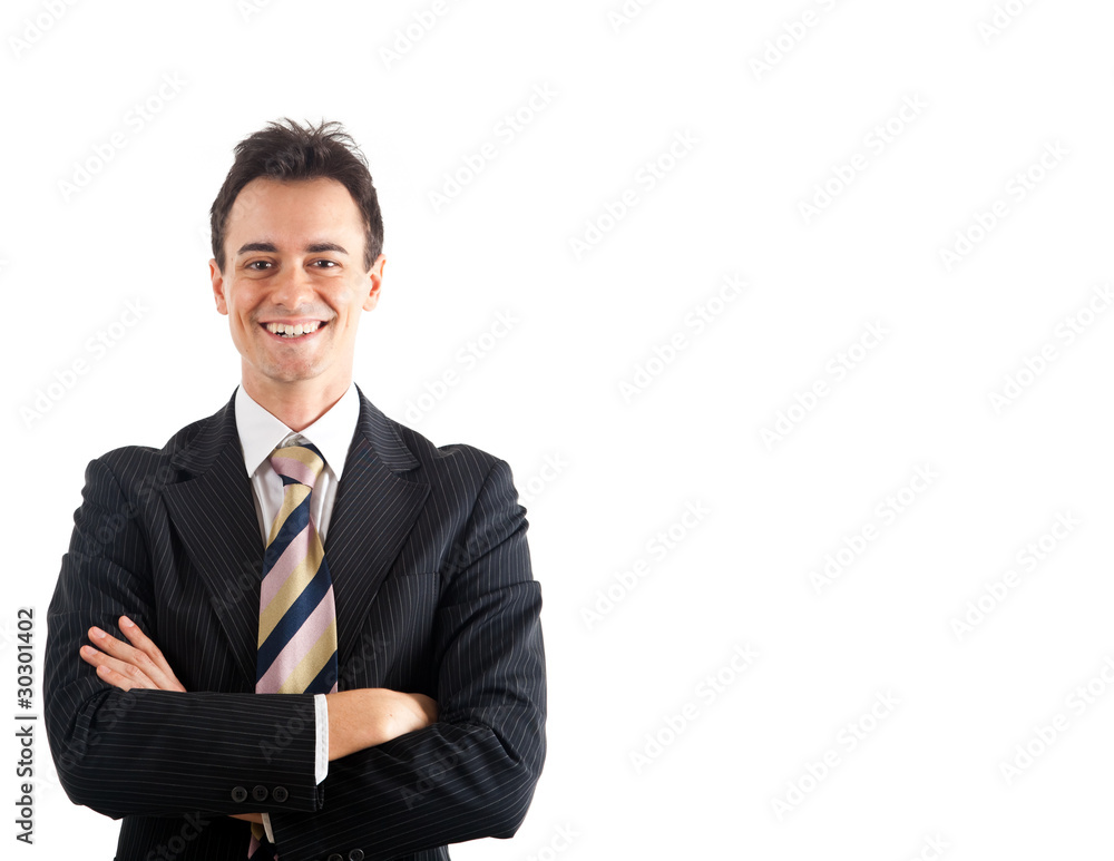 Young smiling businessman isolated on white Young smiling businessman isolated on white