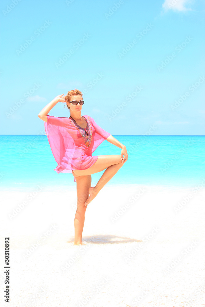 Fototapeta premium woman relaxing on the beach