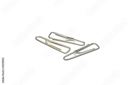 3 paper clips isolated on white