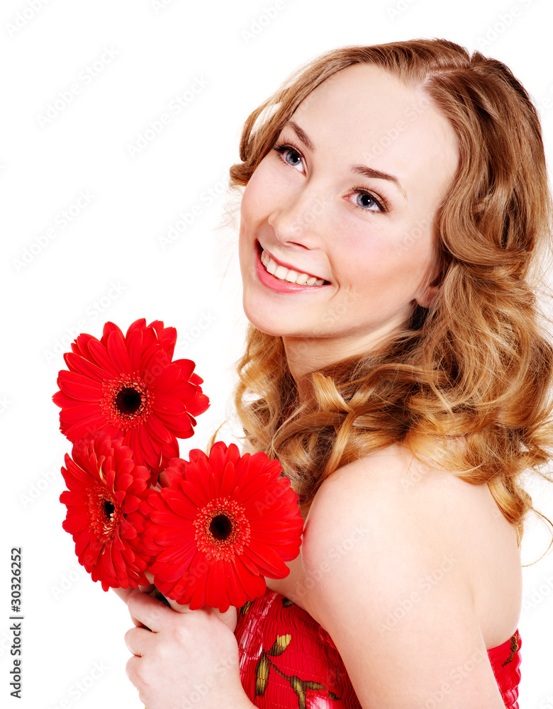 Happy young woman holding flowers. Happy young woman holding flowers.