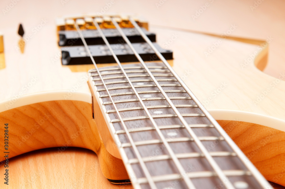 Fototapeta premium Musical concept with wooden guitar
