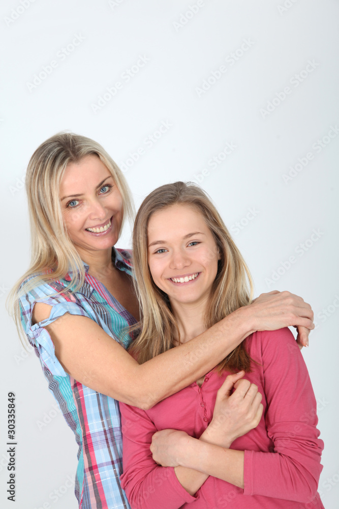 Portrait of smiling blond mother and daughter Portrait of smiling blond mother and daughter