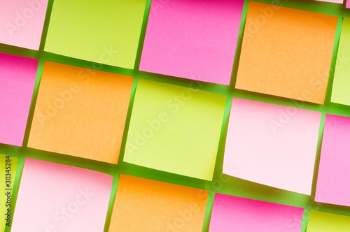 Reminder notes on the bright colorful paper © Elnur