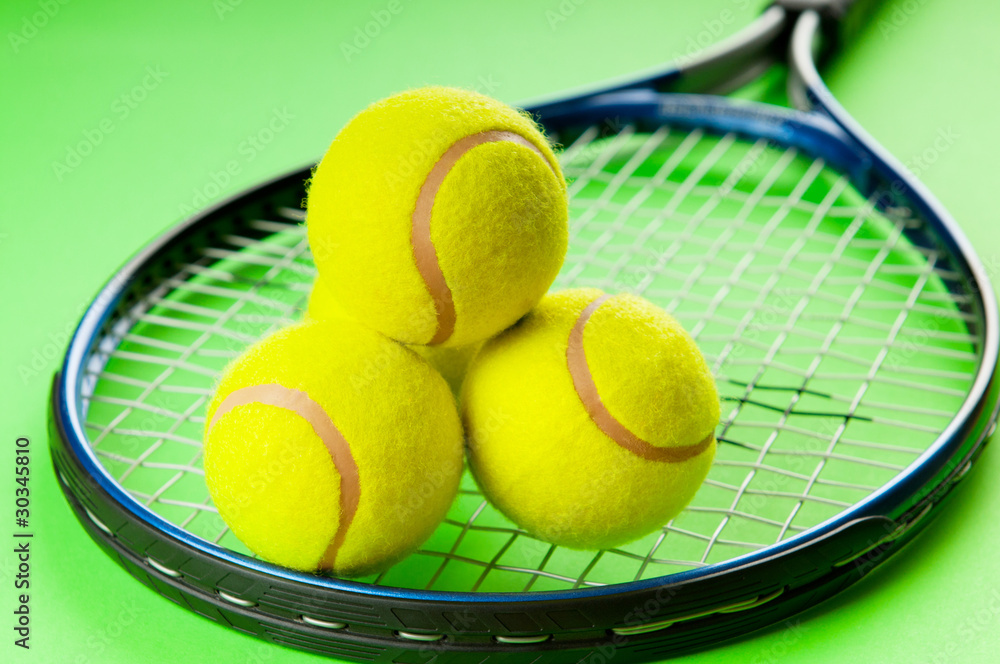 Tennis concept with balls and racket