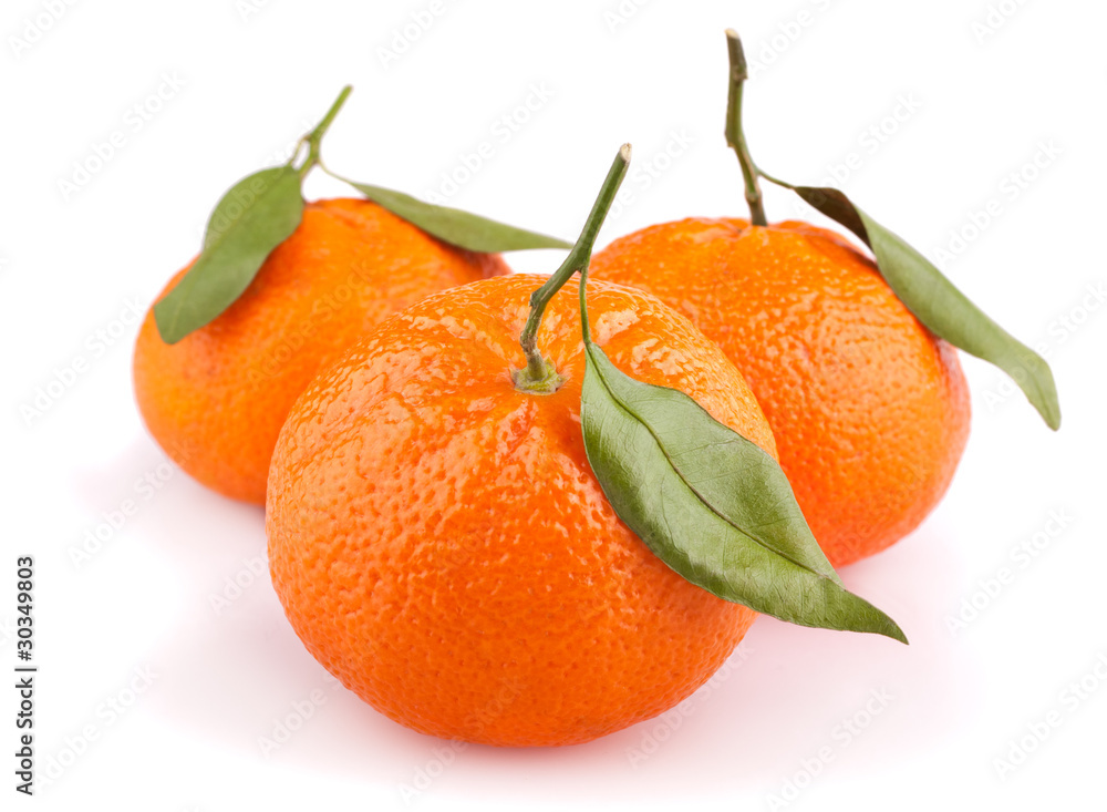 Tangerines with leaves isolated on white Tangerines with leaves isolated on white