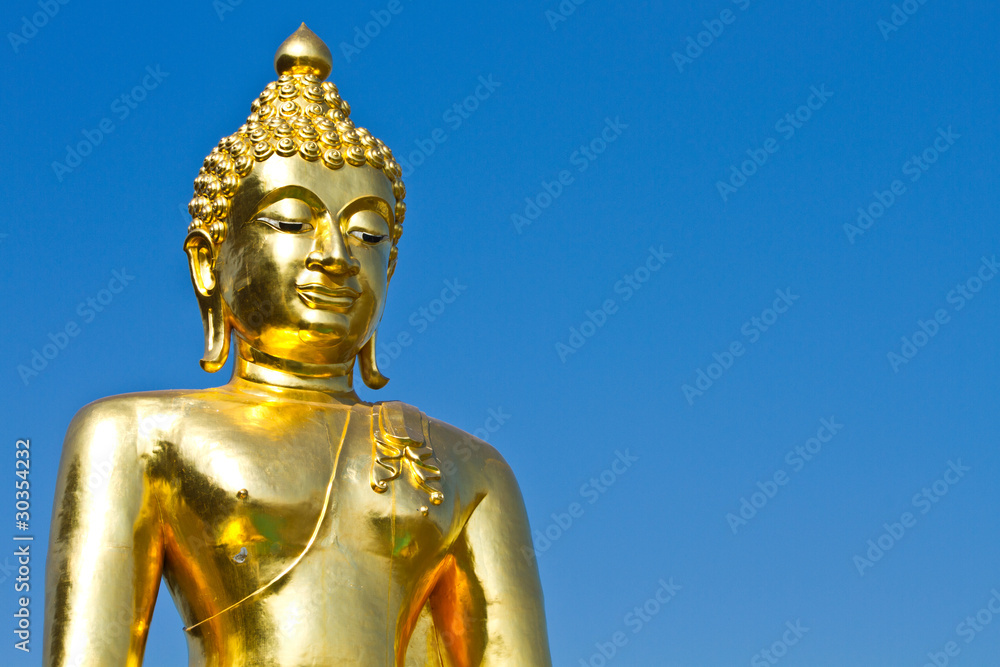 Golden Buddha under the open sky