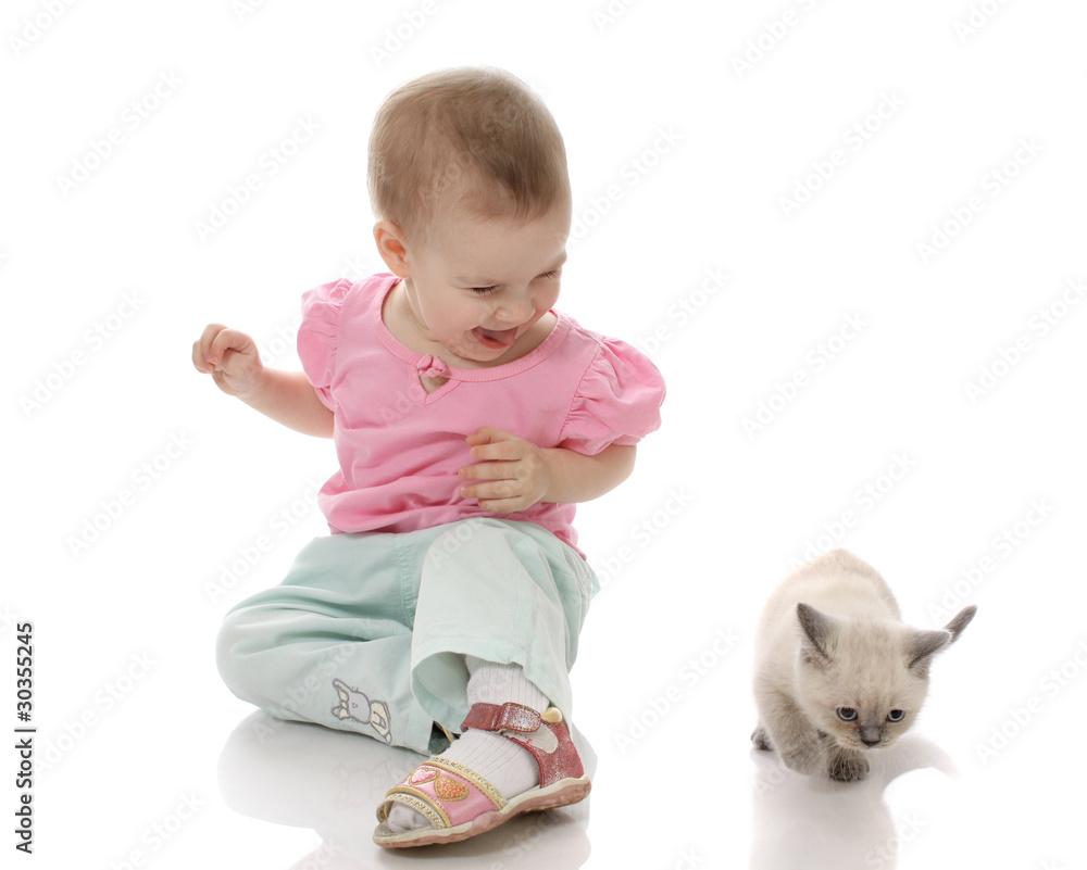 small child with a kitten, isolated. small child with a kitten, isolated.