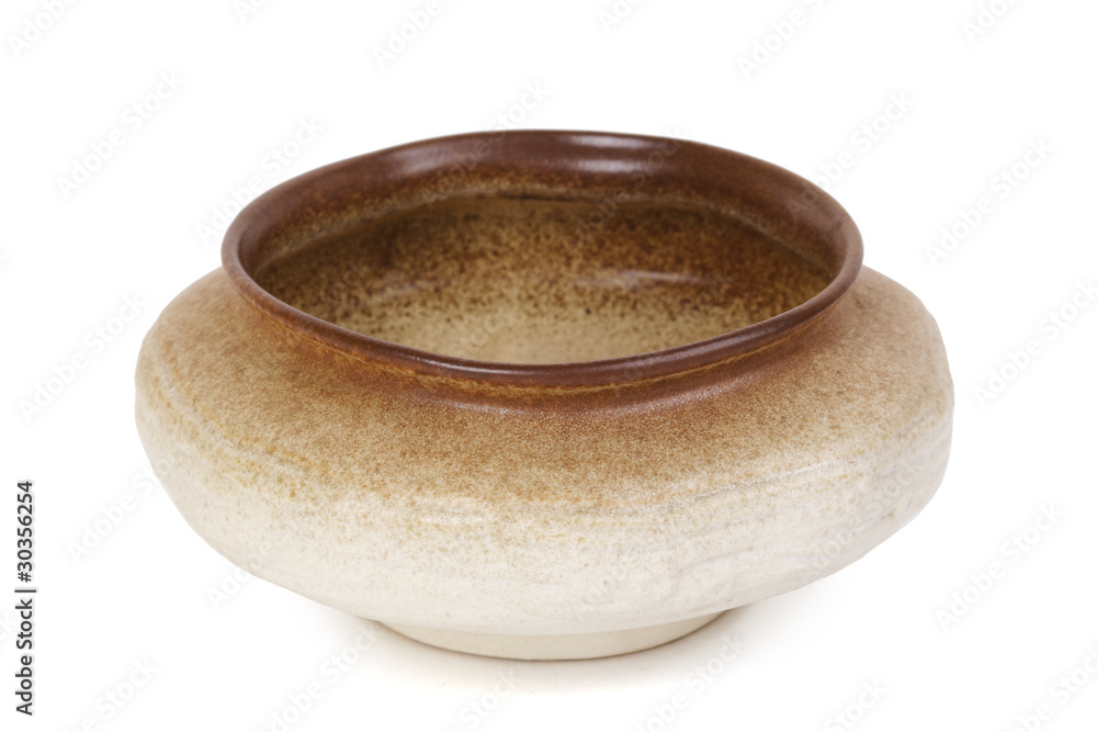 low and wide brown flowerpot, view from above, isolated low and wide brown flowerpot, view from above, isolated