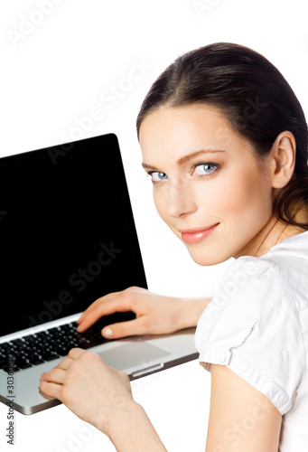 Portrait of businesswoman working with laptop, isolated photo