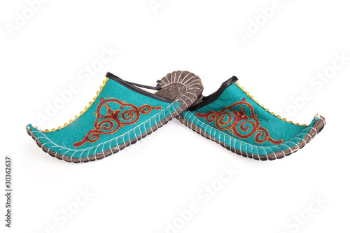 Oriental slippers isolated on white background