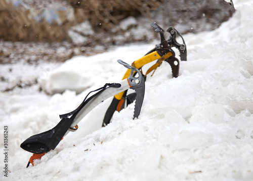 Three ice axes in the snow