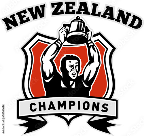 Rugby player raising up championship cup
