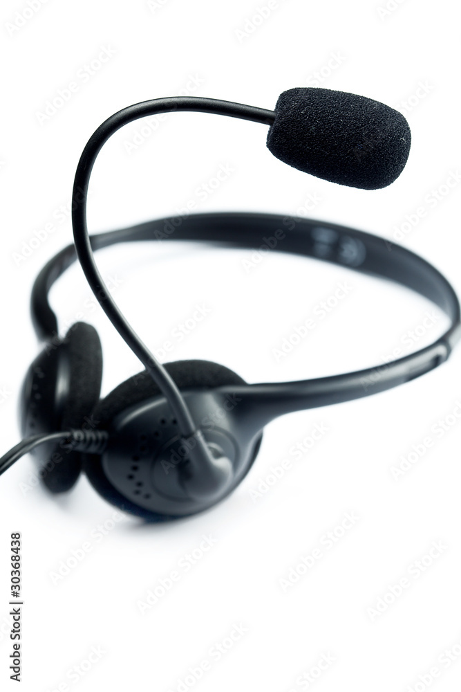 a black headset is isolated on white a black headset is isolated on white