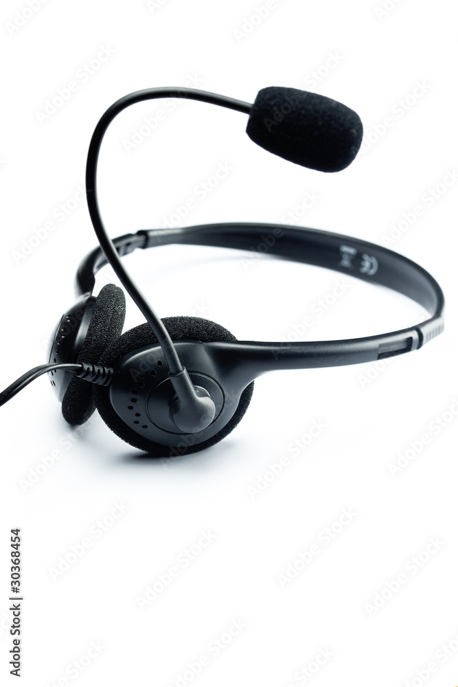 a black headset is isolated on white a black headset is isolated on white