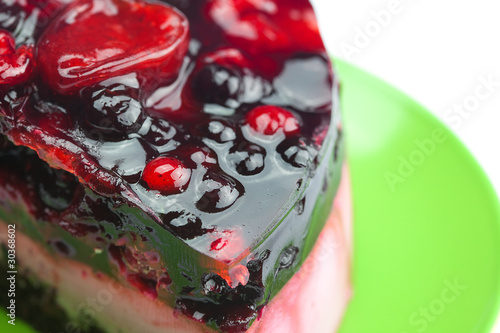 Fototapeta Naklejka Na Ścianę i Meble -  beautiful cake with berries on a plate isolated on white
