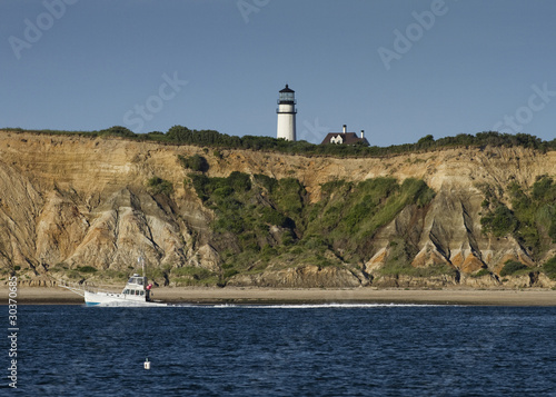 Fishing boat passing Truro Light