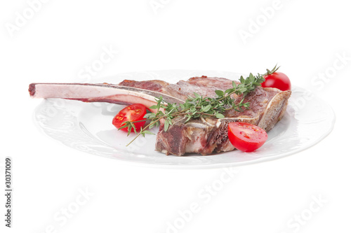 meat food : roast rib on white dish photo