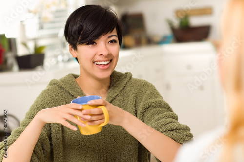 Multi-ethnic Young Attractive Woman Socializing with Friend