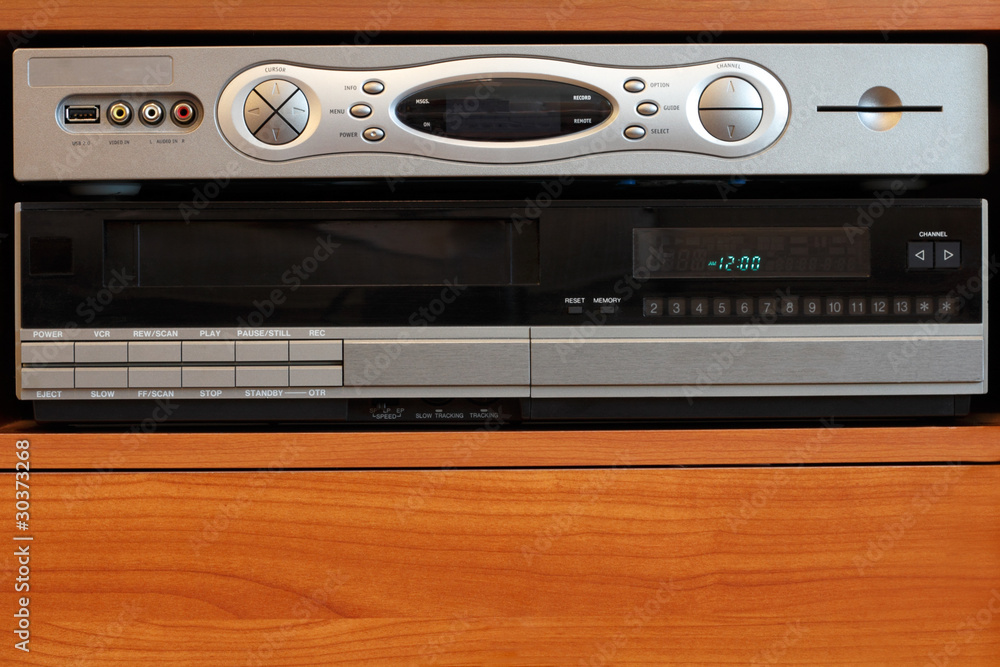 Fototapeta premium New DVR with Old VCR