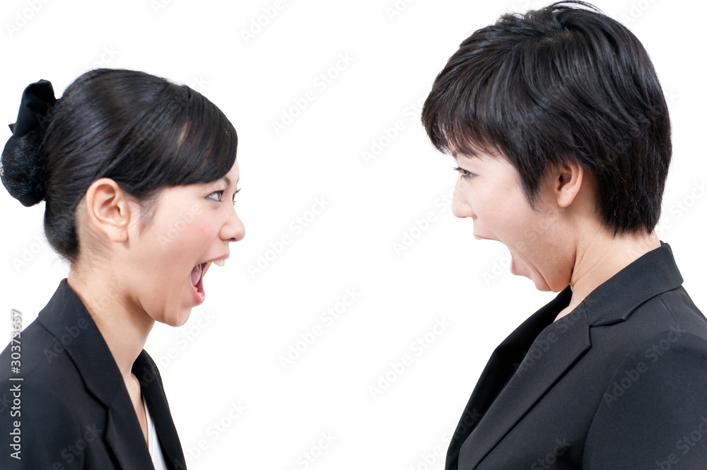 two asian businesswomen bellowing two asian businesswomen bellowing