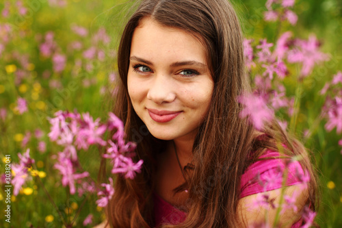 woman on pink flower field © yellowj