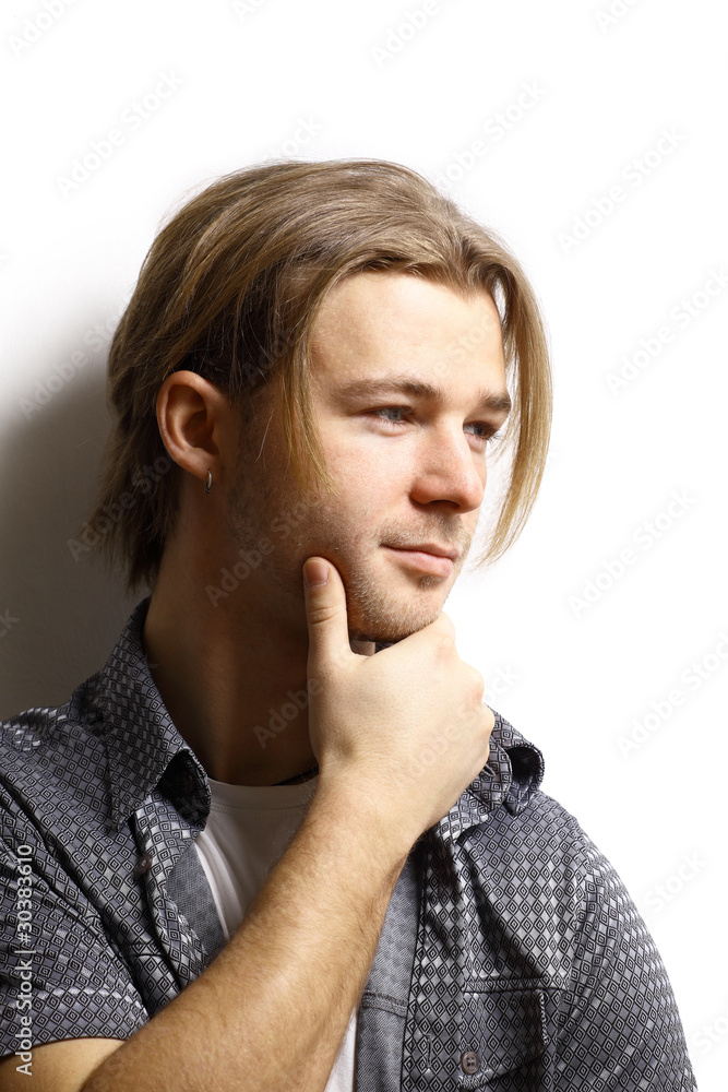 Portrait of a handsome romantic stylish man on white Portrait of a handsome romantic stylish man on white