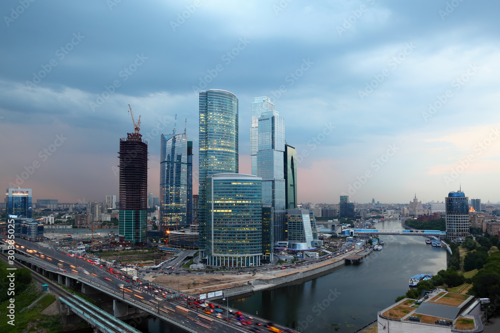Fototapeta premium panorama of Moscow City complex of skyscrapers at evening