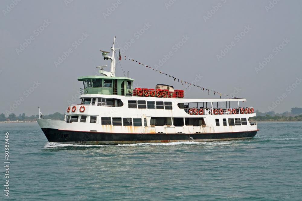 erry carries passengers and tourists to the island erry carries passengers and tourists to the island