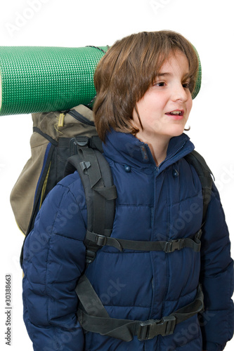 Child with a backpack ready for a trip