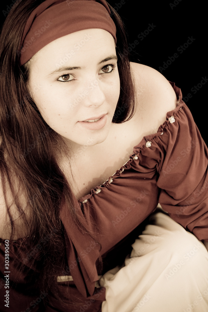 Fototapeta premium Aged Portrait of a Young Gypsy
