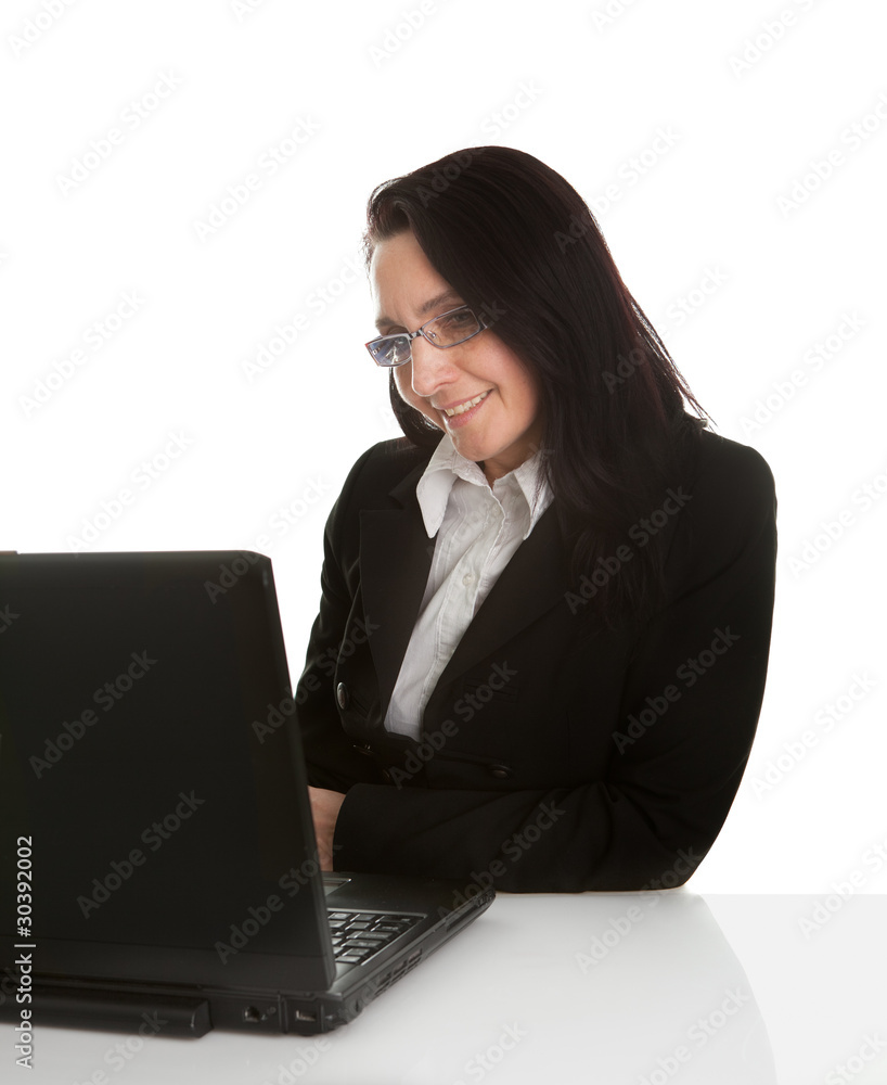 Beautiful business woman working on laptop Beautiful business woman working on laptop