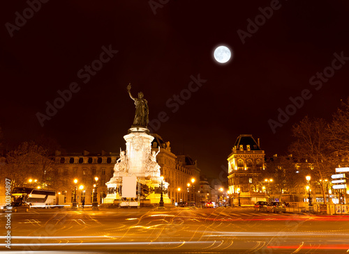 Marianne statue on the Republic square at night