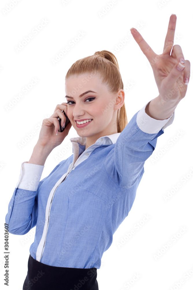 businesswoman with phone and victory gesture businesswoman with phone and victory gesture