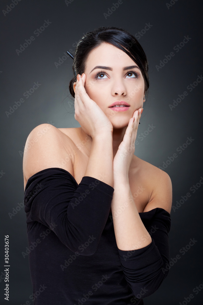 Fototapeta premium young woman looking up
