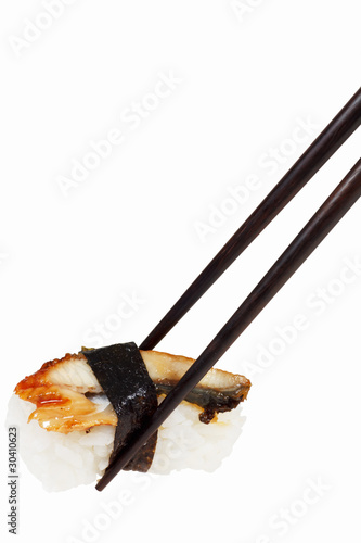 Japanese sushi ready to eat with chopsticks