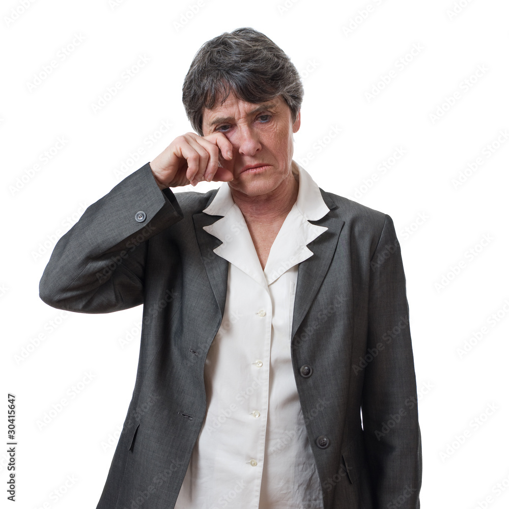 desperate mature businesswoman wiping tears isolated desperate mature businesswoman wiping tears isolated